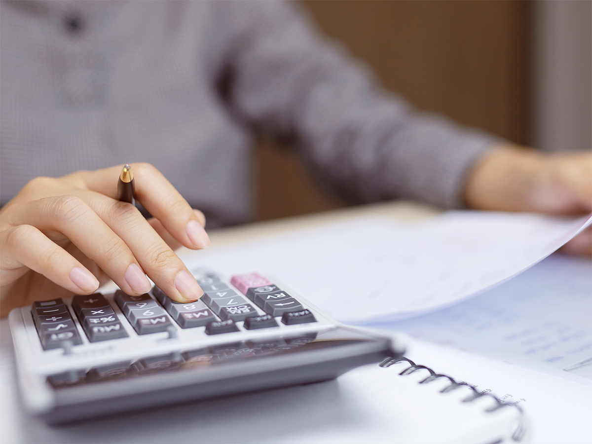 person using calculator