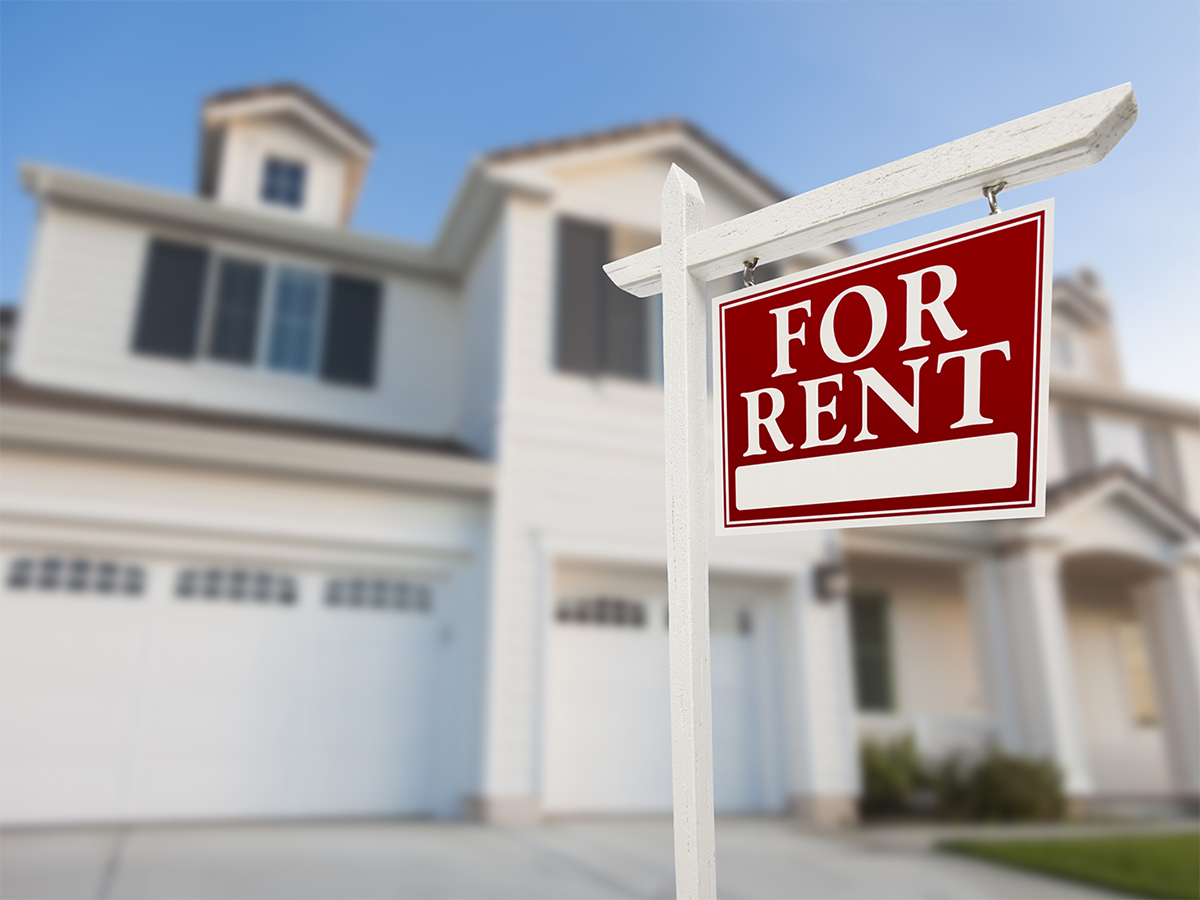 for rent sign in front of house