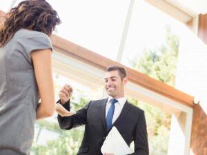 A real estate agent talking with a client